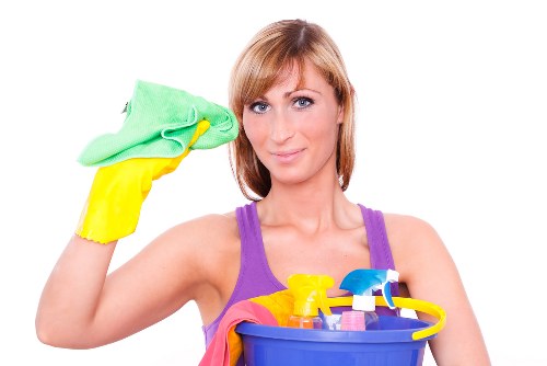Carpet cleaning team preparing equipment with safety checks in place