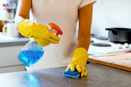 Carpet cleaner preparing equipment safely before a cleaning job