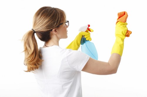 Carpet cleaning technician preparing equipment for a UK service booking